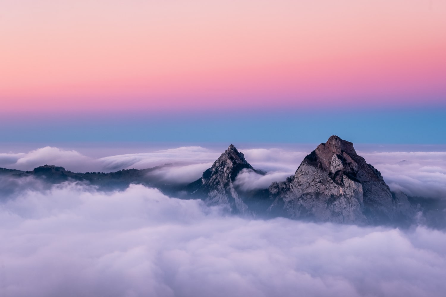 beautiful-aerial-shot-fronalpstock-mountains-switzerland-beautiful-pink-blue-sky-min.jpg